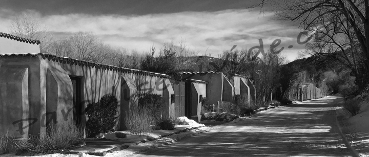 Wonderful Black and White study of an adobe wall in Santa Fe with snow on the ground The shadows cast on the wall are sublime.